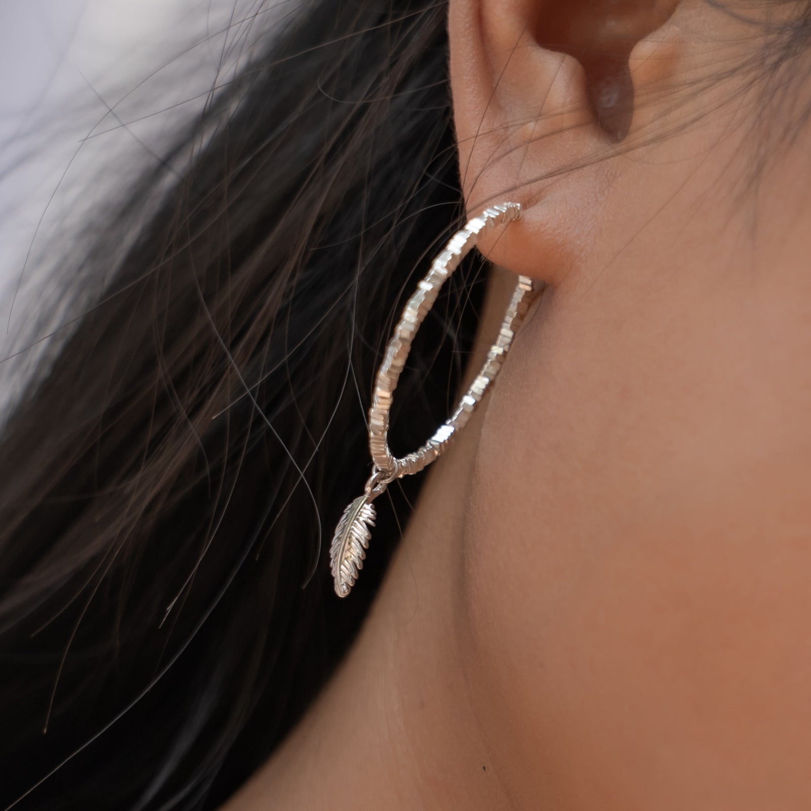 Song of Celebration Hoop Earring - Silver – Eden Jewelry